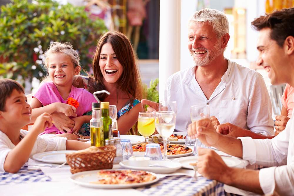 Living with a Stroke: multi generational family having dinner